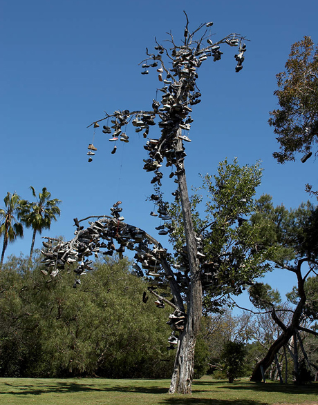 Shoe tossing is a creative collaboration between individuals. This kind of littering has been transformed into a signifying and/or artistic act. Image: Jon Sullivan.